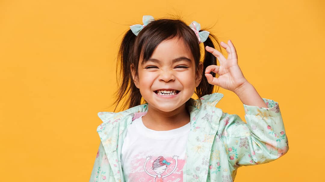 girl displaying i am cree sign