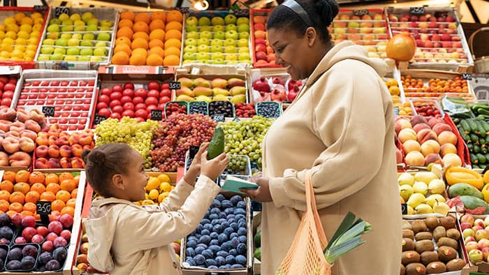 the wow studio applying design theory to arrange fruits in a grocery market